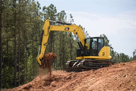 cat 310 mini excavator price|cat 310 lifting capacity.